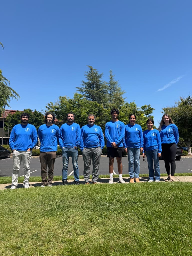 Sound Finance team group photo on a sunny day