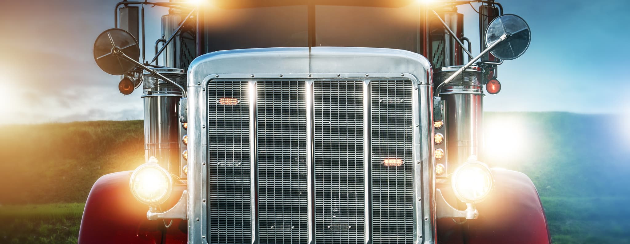 Classic red semi-truck facing forward